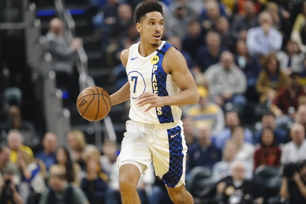 Indiana Pacers guard Malcolm Brogdon (7) in action during an NBA basketball game between the Milwaukee Bucks and the Indiana Pacers in Indianapolis, Wednesday, Feb. 12, 2020. (AP Photo/AJ Mast)