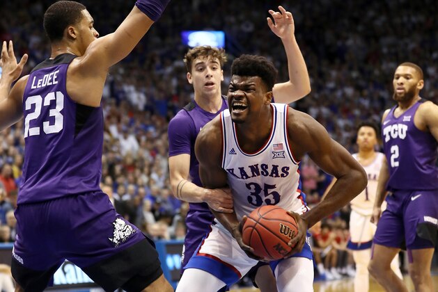 LAWRENCE, KANSAS - MARCH 04:  Udoka Azubuike #35 of the Kansas Jayhawks is fouled by Francisco Farabello #3 of the TCU Horned Frogs during the game at Allen Fieldhouse on March 04, 2020 in Lawrence, Kansas. (Photo by Jamie Squire/Getty Images)