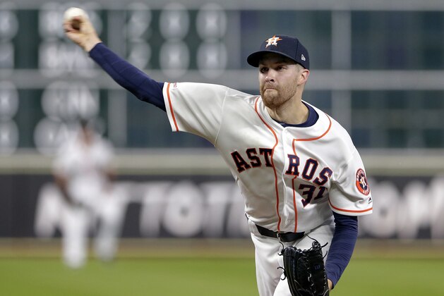 Houston Astros starting pitcher Collin McHugh throws to a Kansas City Royals batter during the first inning of a baseball game Tuesday, May 7, 2019, in Houston. (AP Photo/Michael Wyke)