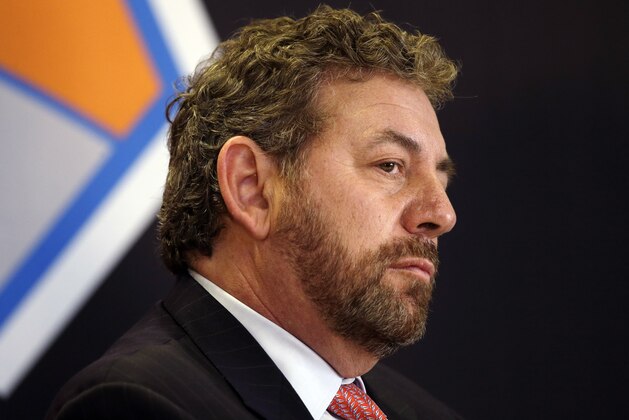 James Dolan, executive chairman of  Madison Square Garden, listens to a question at a news conference where he introduced Phil Jackson as the new president of the New York Knicks, Tuesday, March 18, 2014 in New York. Jackson, who won two NBA titles as a player for the New York Knicks, also won 11 championships while coaching the Chicago Bulls and the Los Angeles Lakers. (AP Photo/Mark Lennihan)