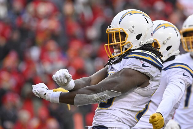 Los Angeles Chargers running back Melvin Gordon (25) celebrates a touchdown against the Kansas City Chiefs during the second half of an NFL football game in Kansas City, Mo., Sunday, Dec. 29, 2019. (AP Photo/Reed Hoffmann)