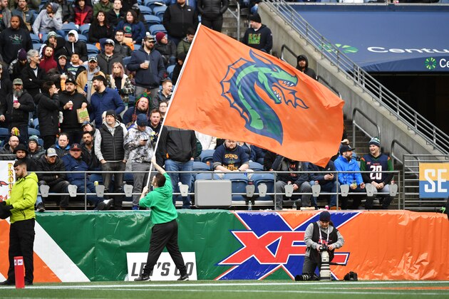 SEATTLE, WA - FEBRUARY 22: A flag waver performs during the XFL game between the Dallas Renegades and the Seattle Dragons at CenturyLink Field on February 22, 2020 in Seattle, Washington. (Photo by Rod Mar/XFL via Getty Images)