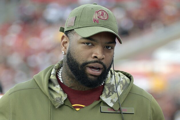 FILE - In this Nov. 11, 2018, file photo, Washington Redskins offensive tackle Trent Williams stands on the sideline during the second half of an NFL football game against the Tampa Bay Buccaneers in Tampa, Fla. A person with knowledge of the situation says Williams has reported to the Redskins, ending his holdout. The person spoke to The Associated Press on condition of anonymity on Tuesday, Oct. 29, 2019, because the team had not announced Williams’ return. He can be kept off the 53-man roster for up to three weeks after reporting.(AP Photo/Phelan M. Ebenhack, File) FILE - In this Nov. 11, 2018, file photo, Washington Redskins offensive tackle Trent Williams stands on the sideline during the second half of an NFL football game against the Tampa Bay Buccaneers in Tampa, Fla. A person with knowledge of the situation says Williams has reported to the Redskins, ending his holdout. The person spoke to The Associated Press on condition of anonymity on Tuesday, Oct. 29, 2019, because the team had not announced Williams’ return. He can be kept off the 53-man roster for up to three weeks after reporting.(AP Photo/Phelan M. Ebenhack, File)