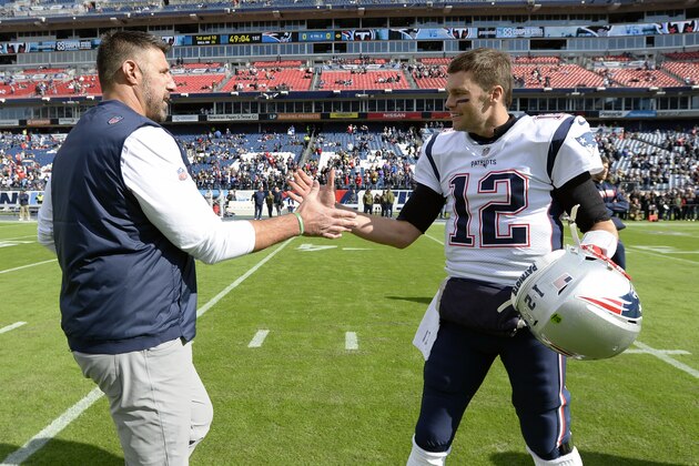 Tennessee Titans head coach Mike Vrabel greets New England Patriots quarterback Tom Brady (12) before an NFL football game Sunday, Nov. 11, 2018, in Nashville, Tenn. (AP Photo/Mark Zaleski)
