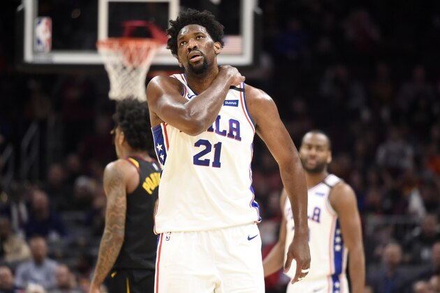CLEVELAND, OHIO - FEBRUARY 26: Joel Embiid #21 of the Philadelphia 76ers reacts after an injury during the first half against the Cleveland Cavaliers at Rocket Mortgage Fieldhouse on February 26, 2020 in Cleveland, Ohio. NOTE TO USER: User expressly acknowledges and agrees that, by downloading and/or using this photograph, user is consenting to the terms and conditions of the Getty Images License Agreement. (Photo by Jason Miller/Getty Images)