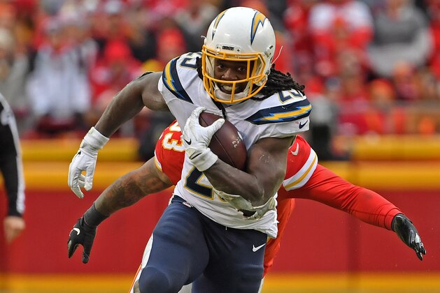 KANSAS CITY, MO - DECEMBER 29:  Running back Melvin Gordon #25 of the Los Angeles Chargers runs up field against the Kansas City Chiefs, during the second half at Arrowhead Stadium on December 29, 2019 in Kansas City, Missouri. (Photo by Peter G. Aiken/Getty Images)