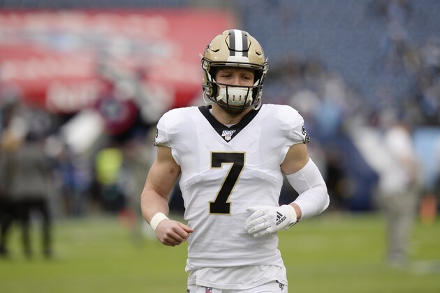 New Orleans Saints quarterback Taysom Hill warms up before an NFL football game against the Tennessee Titans Sunday, Dec. 22, 2019, in Nashville, Tenn. (AP Photo/Mark Zaleski)