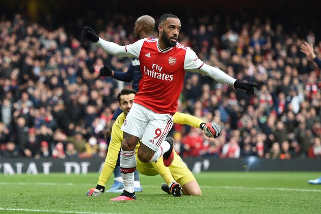 LONDON, ENGLAND - MARCH 07: Alexandre Lacazette of Arsenal celebrates after scoring his team's first goal during the Premier League match between Arsenal FC and West Ham United at Emirates Stadium on March 07, 2020 in London, United Kingdom. (Photo by Harriet Lander/Copa/Getty Images )