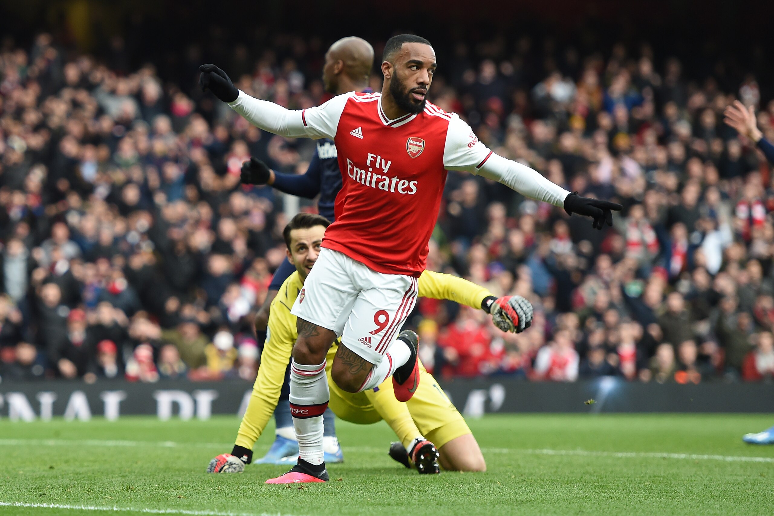 LONDON, ENGLAND - MARCH 07: Alexandre Lacazette of Arsenal celebrates after scoring his team's first goal during the Premier League match between Arsenal FC and West Ham United at Emirates Stadium on March 07, 2020 in London, United Kingdom. (Photo by Harriet Lander/Copa/Getty Images ) LONDON, ENGLAND - MARCH 07: Alexandre Lacazette of Arsenal celebrates after scoring his team's first goal during the Premier League match between Arsenal FC and West Ham United at Emirates Stadium on March 07, 2020 in London, United Kingdom. (Photo by Harriet Lander/Copa/Getty Images )