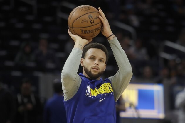 Injured Golden State Warriors guard Stephen Curry shoots before an NBA basketball game against the Miami Heat in San Francisco, Monday, Feb. 10, 2020. (AP Photo/Jeff Chiu)
