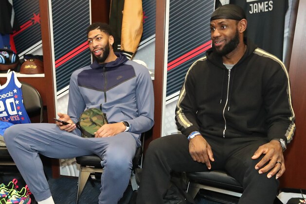 CHICAGO, IL - FEBRUARY 15: Anthony Davis #3 and LeBron James #23 of the Los Angeles Lakers get ready in the locker room during Practice and Media Availability presented by AT&T as part of 2020 NBA All-Star Weekend on February 15, 2020 at Wintrust Arena in Chicago, Illinois. NOTE TO USER: User expressly acknowledges and agrees that, by downloading and/or using this Photograph, user is consenting to the terms and conditions of the Getty Images License Agreement. Mandatory Copyright Notice: Copyright 2020 NBAE (Photo by Nathaniel S. Butler/NBAE via Getty Images)