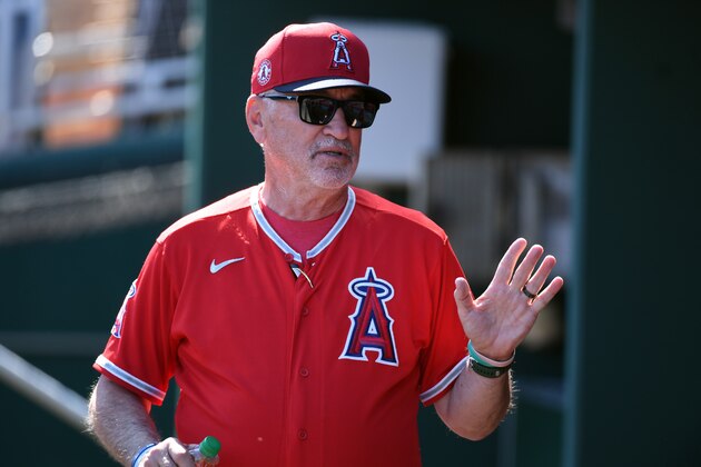 GOODYEAR, ARIZONA - MARCH 03: Manager Joe Maddon #70 of the Los Angeles Angels talks with his players in the dugout prior to a spring training game against the Cleveland Indians at Goodyear Ballpark on March 03, 2020 in Goodyear, Arizona. (Photo by Norm Hall/Getty Images)