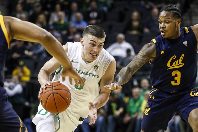 Oregon guard Payton Pritchard (3) drives to the basket against California guard Paris Austin (3) during the first half of an NCAA college basketball game in Eugene, Ore., Thursday, March 5, 2020. (AP Photo/Thomas Boyd) Oregon guard Payton Pritchard (3) drives to the basket against California guard Paris Austin (3) during the first half of an NCAA college basketball game in Eugene, Ore., Thursday, March 5, 2020. (AP Photo/Thomas Boyd)