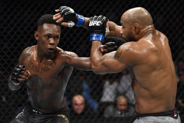 LAS VEGAS, NEVADA - MARCH 07: (L-R) Israel Adesanya of Nigeria punches Yoel Romero of Cuba in their UFC middleweight championship fight during the UFC 248 event at T-Mobile Arena on March 07, 2020 in Las Vegas, Nevada. (Photo by Jeff Bottari/Zuffa LLC)