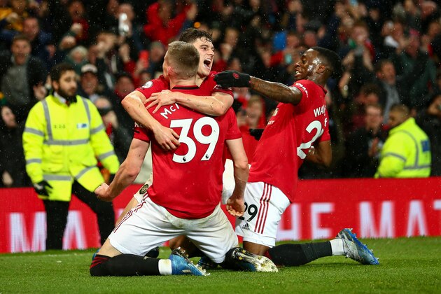 MANCHESTER, ENGLAND - MARCH 08: Scott McTominay of Manchester United celebrates after scoring a goal to make it 2-0 during the Premier League match between Manchester United and Manchester City at Old Trafford on March 8, 2020 in Manchester, United Kingdom. (Photo by Robbie Jay Barratt - AMA/Getty Images)