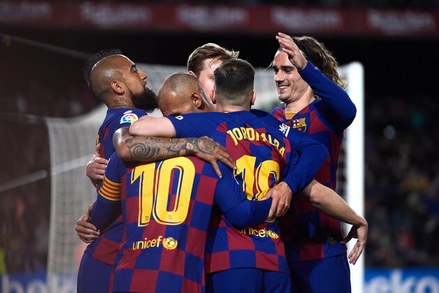 BARCELONA, SPAIN - MARCH 07: FC Barcelona players celebrate their opening goal scored by Lionel Messi during the Liga match between FC Barcelona and Real Sociedad at Camp Nou on March 07, 2020 in Barcelona, Spain. (Photo by Alex Caparros/Getty Images)