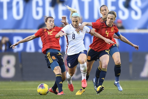 HARRISON, NEW JERSEY - MARCH 08: Julie Ertz #8 of the United States battles Patricia Guijarro #12 and Irene Paredes #4 of Spain for the ball during the first half in the SheBelieves Cup at Red Bull Arena on March 08, 2020 in Harrison, New Jersey. (Photo by Sarah Stier/Getty Images) HARRISON, NEW JERSEY - MARCH 08: Julie Ertz #8 of the United States battles Patricia Guijarro #12 and Irene Paredes #4 of Spain for the ball during the first half in the SheBelieves Cup at Red Bull Arena on March 08, 2020 in Harrison, New Jersey. (Photo by Sarah Stier/Getty Images)