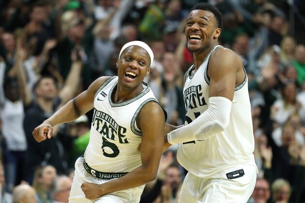 EAST LANSING, MICHIGAN - MARCH 08: Cassius Winston #5 of the Michigan State Spartans celebrates a second half three pointer with Xavier Tillman Sr. #23 while playing the Ohio State Buckeyes at the Breslin Center on March 08, 2020 in East Lansing, Michigan. Michigan State won the game 80-69. (Photo by Gregory Shamus/Getty Images)