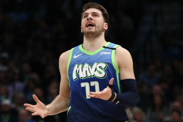 DALLAS, TEXAS - MARCH 06:  Luka Doncic #77 of the Dallas Mavericks reacts during play against the Memphis Grizzlies in the second half at American Airlines Center on March 06, 2020 in Dallas, Texas.  NOTE TO USER: User expressly acknowledges and agrees that, by downloading and or using this photograph, User is consenting to the terms and conditions of the Getty Images License Agreement. (Photo by Ronald Martinez/Getty Images)