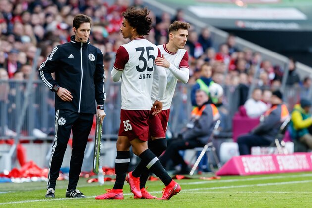 MUNICH, GERMANY - MARCH 08: (BILD ZEITUNG OUT) Leon Goretzka of Bayern Muenchen and Joshua Zirkzee of Bayern Muenchen substitutes during the Bundesliga match between FC Bayern Muenchen and FC Augsburg at Allianz Arena on March 8, 2020 in Munich, Germany. (Photo by Roland Krivec/DeFodi Images via Getty Images)