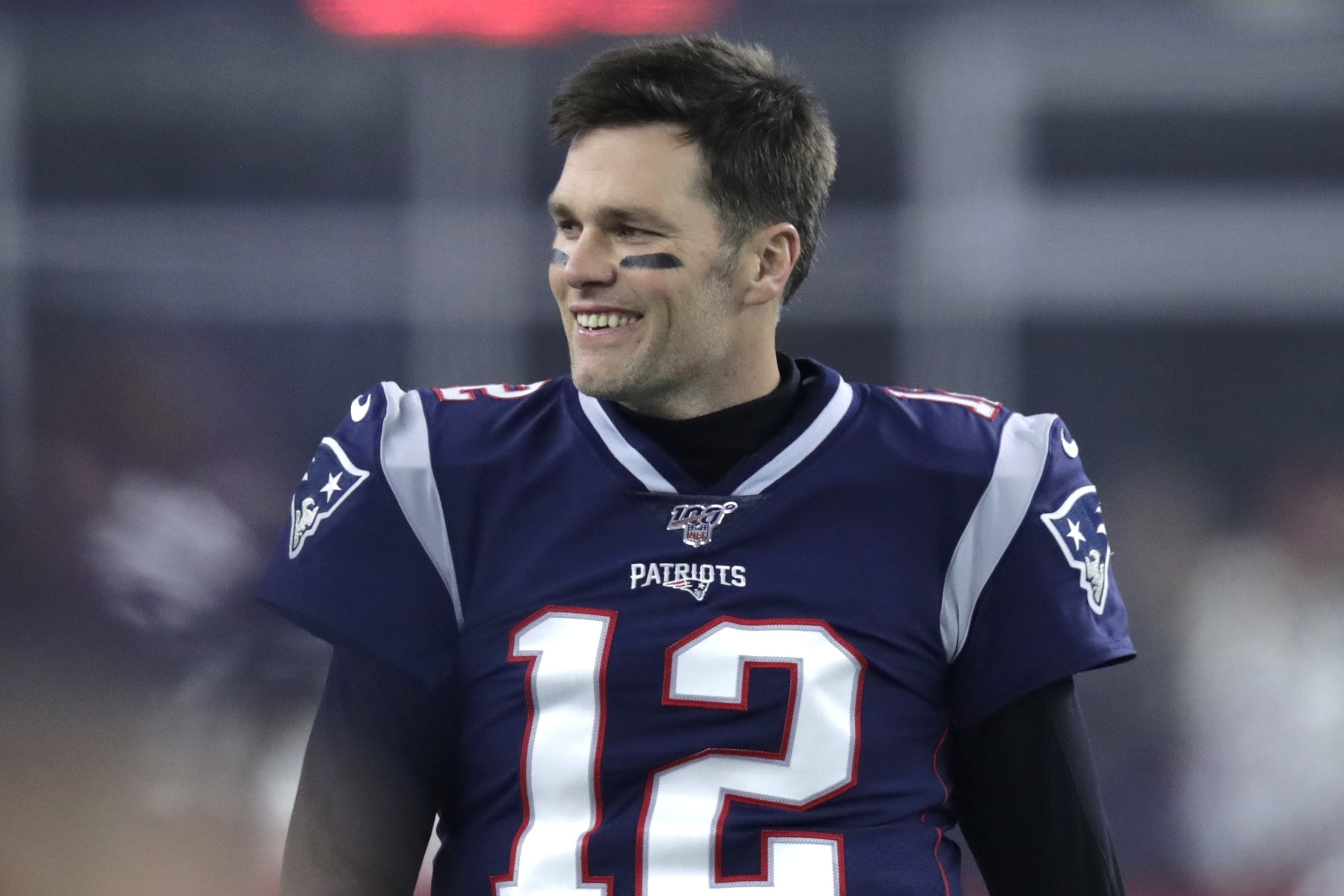 New England Patriots quarterback Tom Brady walks on the field before an NFL wild-card playoff football game against the Tennessee Titans, Saturday, Jan. 4, 2020, in Foxborough, Mass. (AP Photo/Charles Krupa)