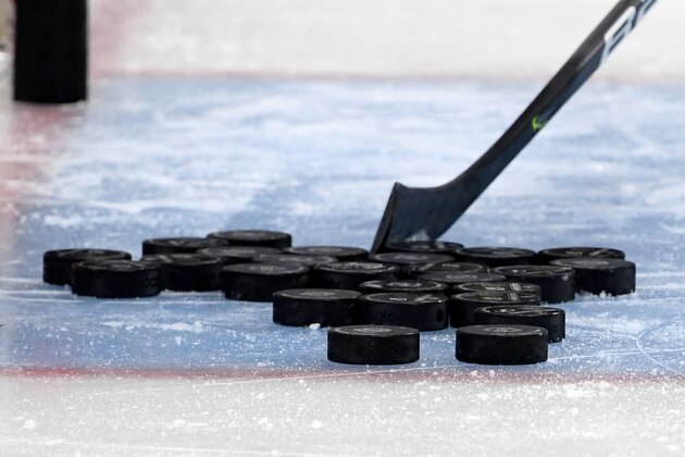 LAS VEGAS, NEVADA - FEBRUARY 20:  Hockey pucks are gathered in the crease during warmups before a game between the Tampa Bay Lightning and the Vegas Golden Knights at T-Mobile Arena on February 20, 2020 in Las Vegas, Nevada. The Golden Knights defeated the Lightning 5-3.  (Photo by Ethan Miller/Getty Images)