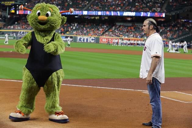 HOUSTON, TEXAS - SEPTEMBER 18: Houston Astros mascot Orbit challenges WWE Superstar Matt Hardy to a ladder match at Minute Maid Park on September 18, 2019 in Houston, Texas. (Photo by Bob Levey/Getty Images)