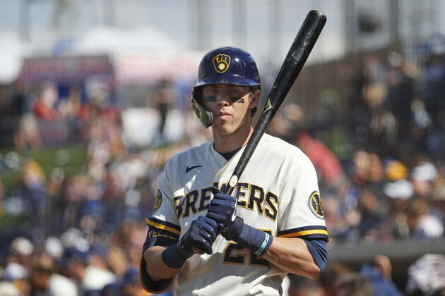 Milwaukee Brewers' Christian Yelich in the batting circle during a spring training baseball game against the Los Angeles Angels, Sunday, March 8, 2020, in Phoenix, Ariz. (AP Photo/Sue Ogrocki)