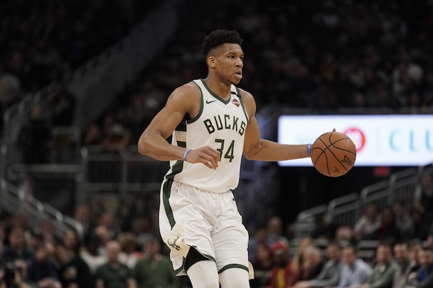 Milwaukee Bucks' Giannis Antetokounmpo dribbles during the second half of an NBA basketball game against the Indiana Pacers Wednesday, March 4, 2020, in Milwaukee. The Bucks won 119-100. (AP Photo/Morry Gash)