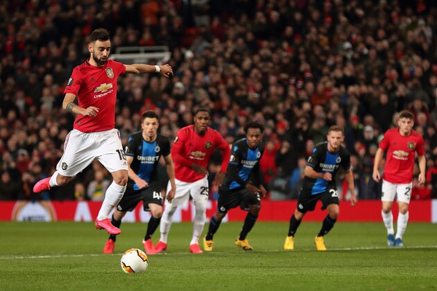 MANCHESTER, ENGLAND - FEBRUARY 27: Bruno Fernandes of Manchester United scores a penalty to make it 1-0 during the UEFA Europa League round of 32 second leg match between Manchester United and Club Brugge at Old Trafford on February 27, 2020 in Manchester, United Kingdom. (Photo by James Williamson - AMA/Getty Images)