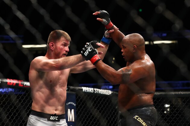 ANAHEIM, CALIFORNIA - AUGUST 17: Daniel Cormier throws a punch at Stipe Miocic in the second round during their UFC Heavyweight Title Bout at UFC 241 at Honda Center on August 17, 2019 in Anaheim, California. (Photo by Joe Scarnici/Getty Images) ANAHEIM, CALIFORNIA - AUGUST 17: Daniel Cormier throws a punch at Stipe Miocic in the second round during their UFC Heavyweight Title Bout at UFC 241 at Honda Center on August 17, 2019 in Anaheim, California. (Photo by Joe Scarnici/Getty Images)