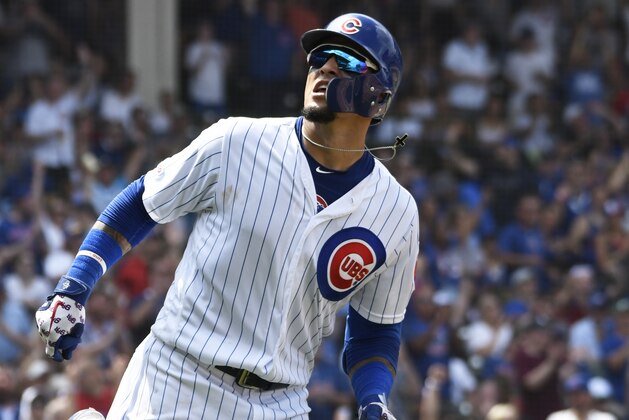 Chicago Cubs' Javier Baez runs the bases after hitting a home run against the San Diego Padres during the fifth inning of a baseball game, Friday, July,19, 2019, in Chicago. (AP Photo/David Banks) Chicago Cubs' Javier Baez runs the bases after hitting a home run against the San Diego Padres during the fifth inning of a baseball game, Friday, July,19, 2019, in Chicago. (AP Photo/David Banks)