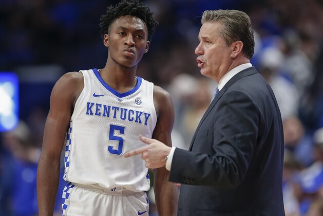 LEXINGTON, KY - FEBRUARY 23: Immanuel Quickley #5 of the Kentucky Wildcats listens to Head coach John Calipari of the Kentucky Wildcats during the game against the Auburn Tigers at Rupp Arena on February 23, 2019 in Lexington, Kentucky. (Photo by Michael Hickey/Getty Images)