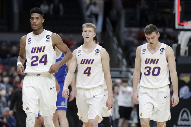 Northern Iowa's Isaiah Brown (24), AJ Green (4) and Spencer Haldeman (30) head off the court following an NCAA college basketball game against Drake in the quarterfinal round of the Missouri Valley Conference men's tournament Friday, March 6, 2020, in St. Louis. Drake upset Northern Iowa 77-56. (AP Photo/Jeff Roberson)