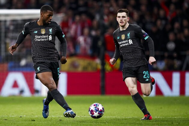 MADRID, SPAIN - FEBRUARY 18: (L-R) Georginio Wijnaldum of Liverpool FC, Andy Robertson of Liverpool FC during the UEFA Champions League  match between Atletico Madrid v Liverpool at the Estadio Wanda Metropolitano on February 18, 2020 in Madrid Spain (Photo by David S. Bustamante/Soccrates/Getty Images)