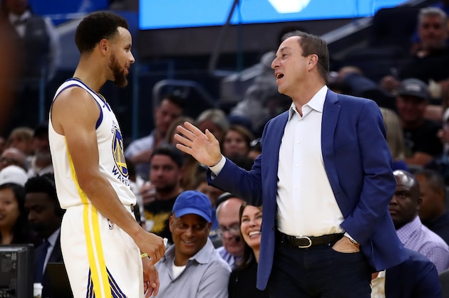 SAN FRANCISCO, CALIFORNIA - OCTOBER 05:  Golden State Warriors owner Joe Lacob speaks to Stephen Curry #30 during their game against the Los Angeles Lakers at Chase Center on October 05, 2019 in San Francisco, California.  NOTE TO USER: User expressly acknowledges and agrees that, by downloading and or using this photograph, User is consenting to the terms and conditions of the Getty Images License Agreement.  (Photo by Ezra Shaw/Getty Images)