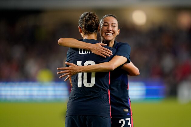 ORLANDO, FL - MARCH 05: Carli Lloyd #10 of the United States scores a goal and celebrates with Christen Press #23 during a game between England and USWNT at Exploria Stadium on March 05, 2020 in Orlando, Florida. (Photo by Brad Smith/ISI Photos/Getty Images)