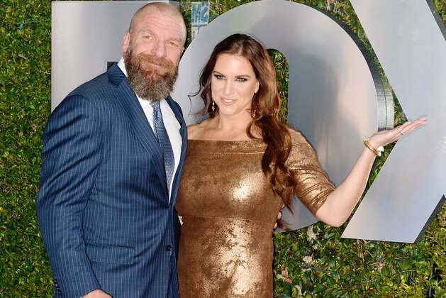 LOS ANGELES, CALIFORNIA - OCTOBER 04: Paul 'Triple H' Levesque and Stephanie McMahon attend WWE 20th Anniversary Celebration Marking Premiere of WWE Friday Night SmackDown on FOX at Staples Center on October 04, 2019 in Los Angeles, California. (Photo by Jerod Harris/Getty Images)