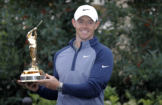 Rory McIlroy, of Northern Ireland, holds the trophy after winning The Players Championship golf tournament Sunday, March 17, 2019, in Ponte Vedra Beach, Fla. (AP Photo/Gerald Herbert)