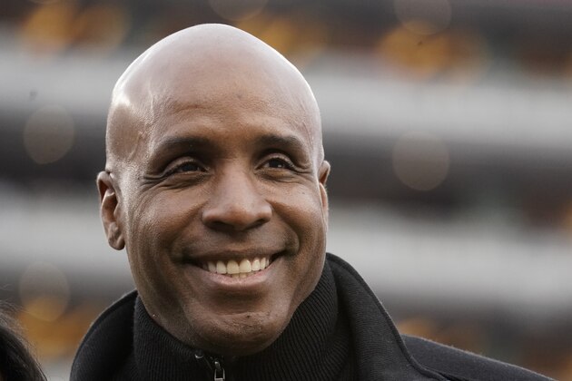 Former baseball player Barry Bonds smiles before the NFL NFC Championship football game between the San Francisco 49ers and the Green Bay Packers Sunday, Jan. 19, 2020, in Santa Clara, Calif. (AP Photo/Tony Avelar)