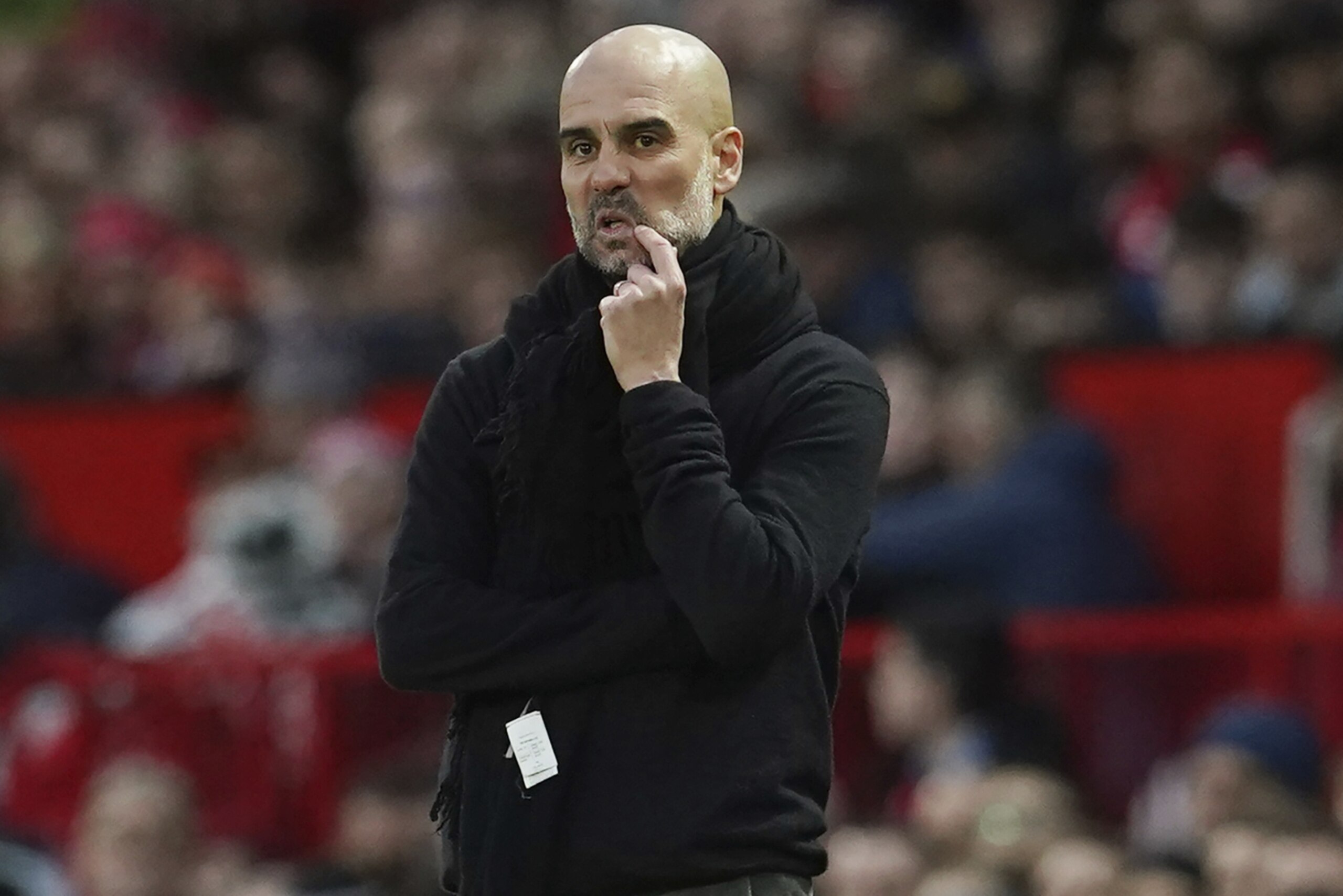 Manchester City's head coach Pep Guardiola reacts during the English Premier League soccer match between Manchester United and Manchester City at Old Trafford in Manchester, England, Sunday, March 8, 2020. (AP Photo/Dave Thompson) Manchester City's head coach Pep Guardiola reacts during the English Premier League soccer match between Manchester United and Manchester City at Old Trafford in Manchester, England, Sunday, March 8, 2020. (AP Photo/Dave Thompson)