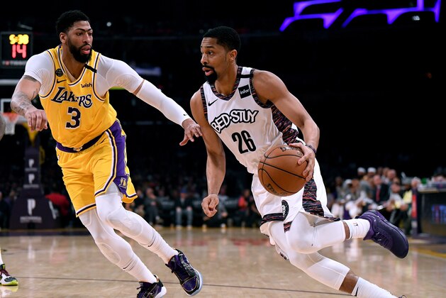 LOS ANGELES, CALIFORNIA - MARCH 10:  Spencer Dinwiddie #26 of the Brooklyn Nets drives to the basket on Anthony Davis #3 of the Los Angeles Lakers during the first half at Staples Center on March 10, 2020 in Los Angeles, California. (Photo by Harry How/Getty Images)  NOTE TO USER: User expressly acknowledges and agrees that, by downloading and or using this photograph, User is consenting to the terms and conditions of the Getty Images License Agreement.
