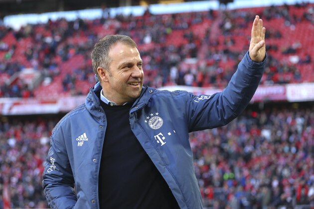 Bayern's interim head coach Hans-Dieter Flick arrives before the German Bundesliga soccer match between FC Bayern Munich and FC Augsburg in Munich, Germany, Sunday, March 8, 2020. (AP Photo/Matthias Schrader)