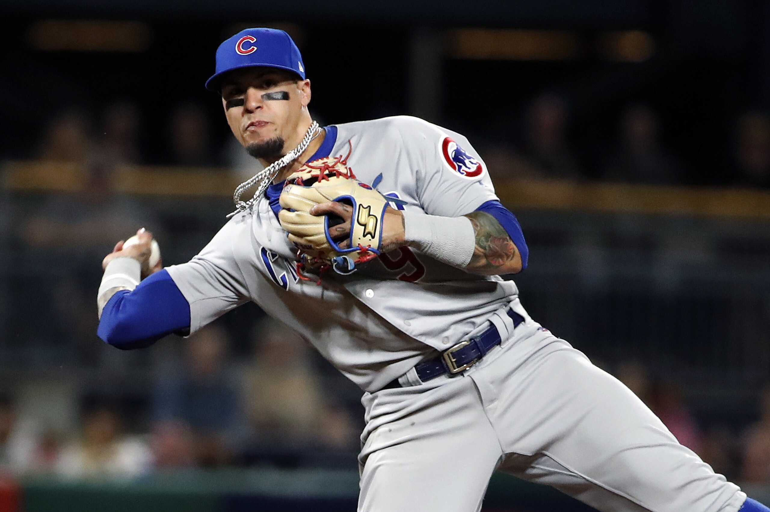 Chicago Cubs shortstop Javier Baez throws to first to get the inning-ending out, after fielding a ground ball by Pittsburgh Pirates' Starling Marte, during the sixth inning of a baseball game in Pittsburgh, Monday, July 1, 2019. The Pirates won 18-5. (AP Photo/Gene J. Puskar) Chicago Cubs shortstop Javier Baez throws to first to get the inning-ending out, after fielding a ground ball by Pittsburgh Pirates' Starling Marte, during the sixth inning of a baseball game in Pittsburgh, Monday, July 1, 2019. The Pirates won 18-5. (AP Photo/Gene J. Puskar)