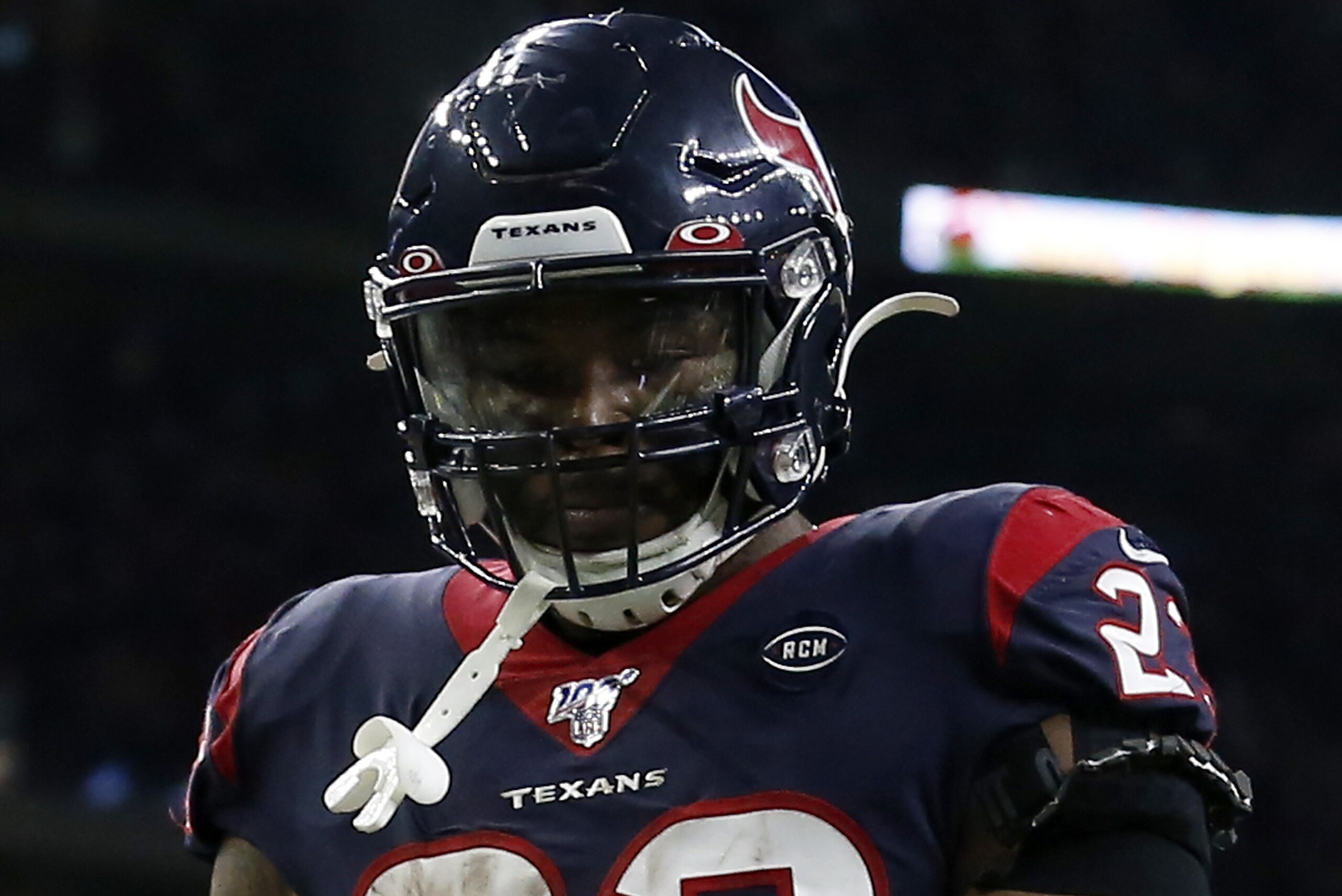 HOUSTON, TEXAS - JANUARY 04: Running back Carlos Hyde #23 of the Houston Texans celebrates after a touchdown in the fourth quarter of the AFC Wild Card Playoff game against the Buffalo Bills at NRG Stadium on January 04, 2020 in Houston, Texas. (Photo by Tim Warner/Getty Images)