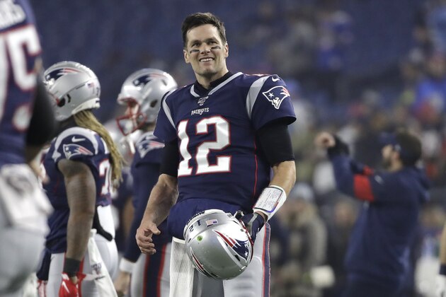 New England Patriots quarterback Tom Brady warms up before an NFL wild-card playoff football game against the Tennessee Titans, Saturday, Jan. 4, 2020, in Foxborough, Mass. (AP Photo/Elise Amendola)