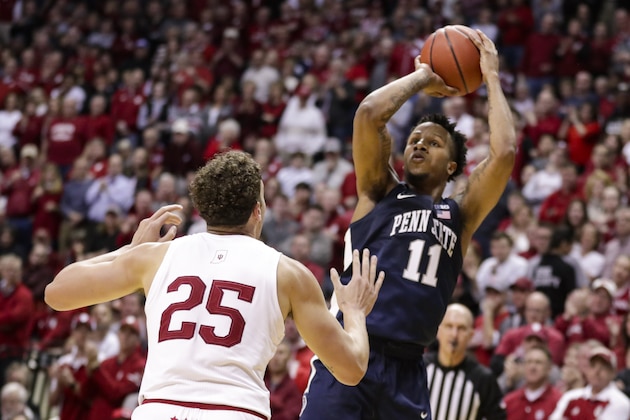 Penn State forward Lamar Stevens (11) shoots over Indiana forward Race Thompson (25) in the second half of an NCAA college basketball game in Bloomington, Ind., Sunday, Feb. 23, 2020. Indiana defeated Penn State 68-60. (AP Photo/Michael Conroy)