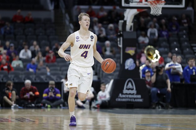 Northern Iowa's AJ Green brings the ball down the court during the second half of an NCAA college basketball game against Drake in the quarterfinal round of the Missouri Valley Conference men's tournament Friday, March 6, 2020, in St. Louis. (AP Photo/Jeff Roberson)