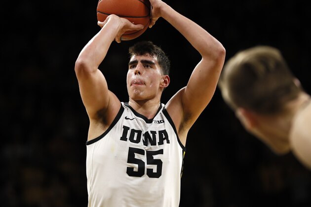 Iowa center Luka Garza shoots a free throw during an NCAA college basketball game against Purdue, Tuesday, March 3, 2020, in Iowa City, Iowa. (AP Photo/Charlie Neibergall)