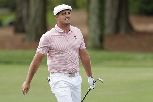 Bryson DeChambeau follows his shot on the first fairway during the second round of the Arnold Palmer Invitational golf tournament Friday, March 6, 2020, in Orlando, Fla. (AP Photo/John Raoux)